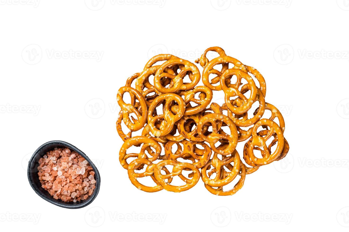 Snack Salted crispy Pretzel on wooden board. Isolated, white background. photo