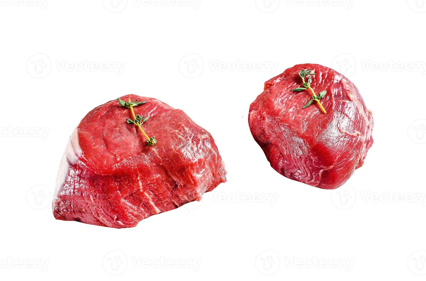 Marble beef tenderloin. Raw filet Mignon steak Isolated on white background. Top view. photo