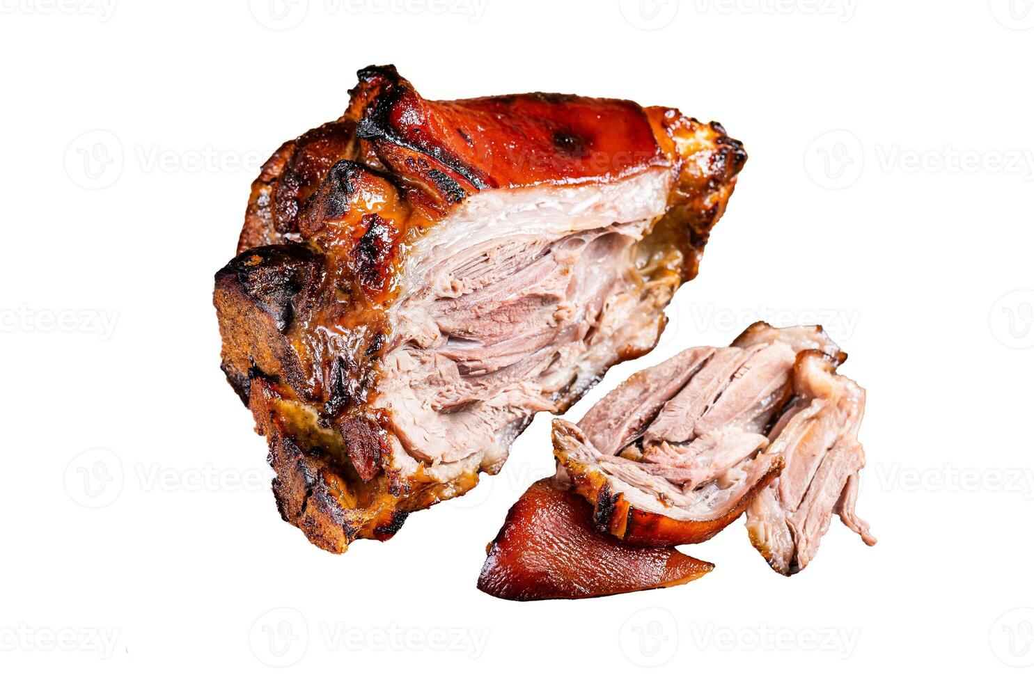 Roasted pork Shank, knuckle on a wooden board. Isolated, white background. photo