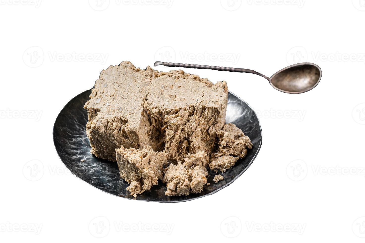 Homemade sunflower halva with honey. Isolated on white background. Top view. photo