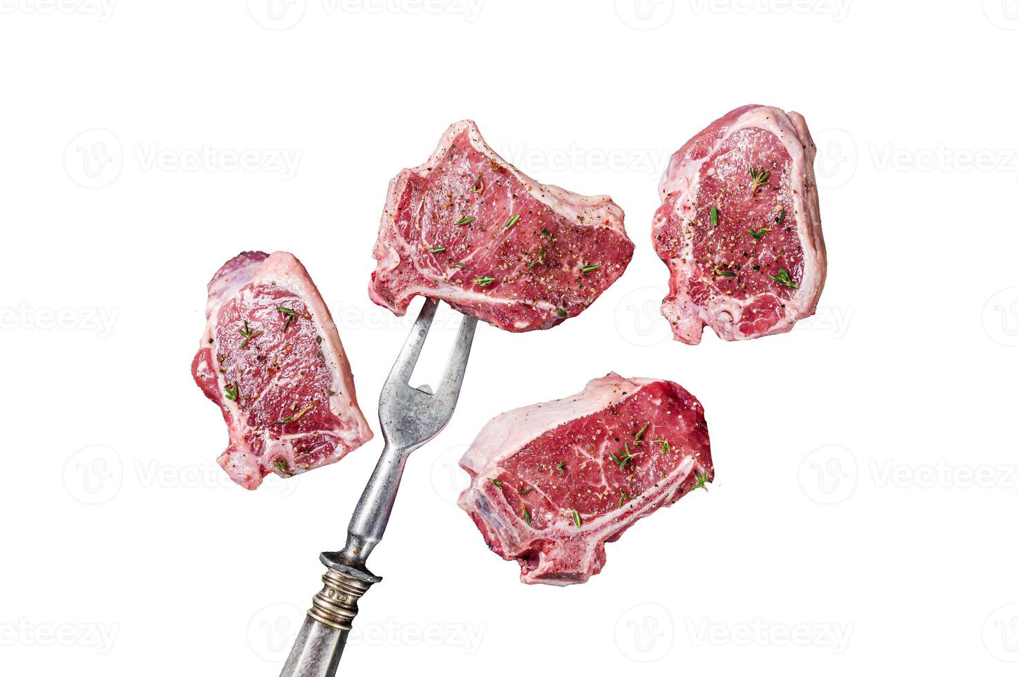 Raw lamb loin steaks, chops cutlets Isolated on white background, top view. photo