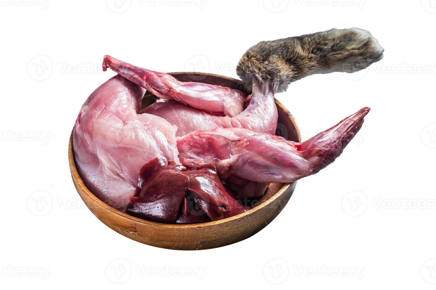 Raw hare game meat, legs and offals in wooden plate with herb. Isolated on white background. Top view. photo