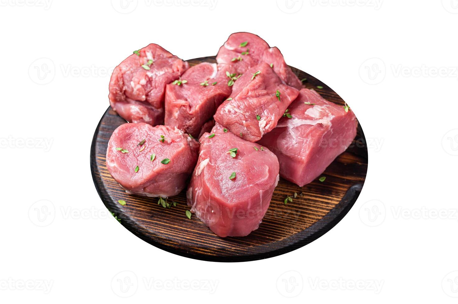 Raw pork sliced tenderloin fillet meat for medallions steaks on a wooden cutting board. Isolated on white background. photo
