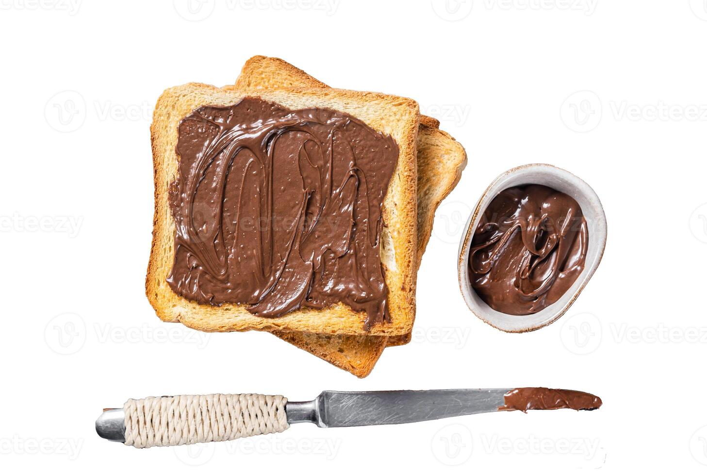 Toast with chocolate Hazelnut spread on wooden board. Isolated, white background. photo