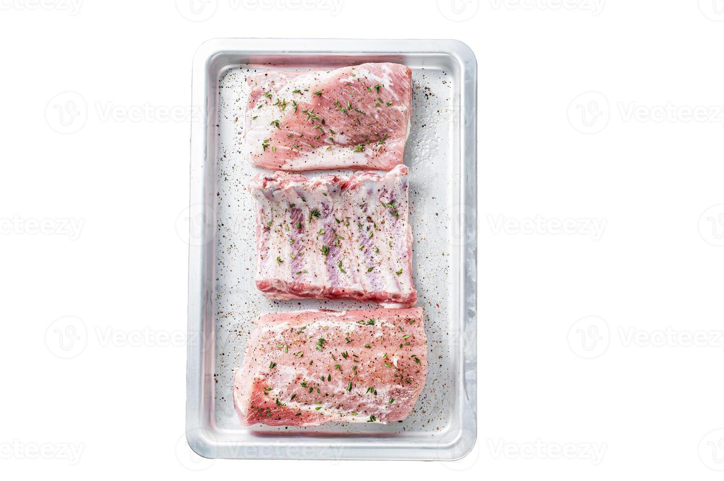 Set of Raw pork cuts, loin meat, spare ribs and brisket. Isolated on white background, top view. photo