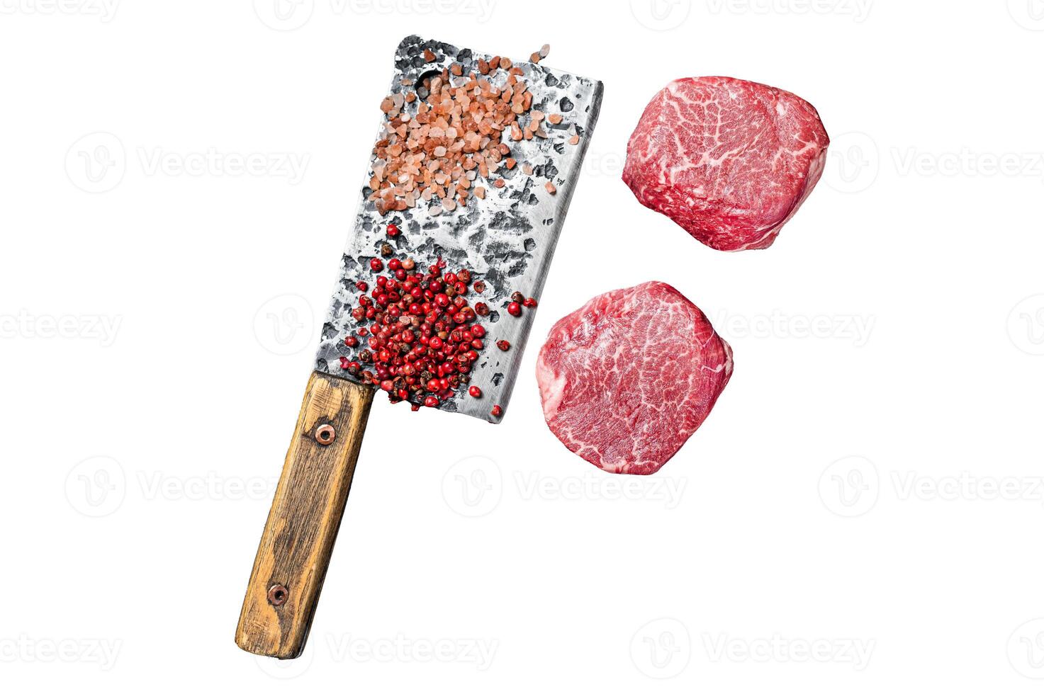 Raw steaks fillet Mignon on a butcher cleaver. Beef tenderloin. Isolated, white background. photo