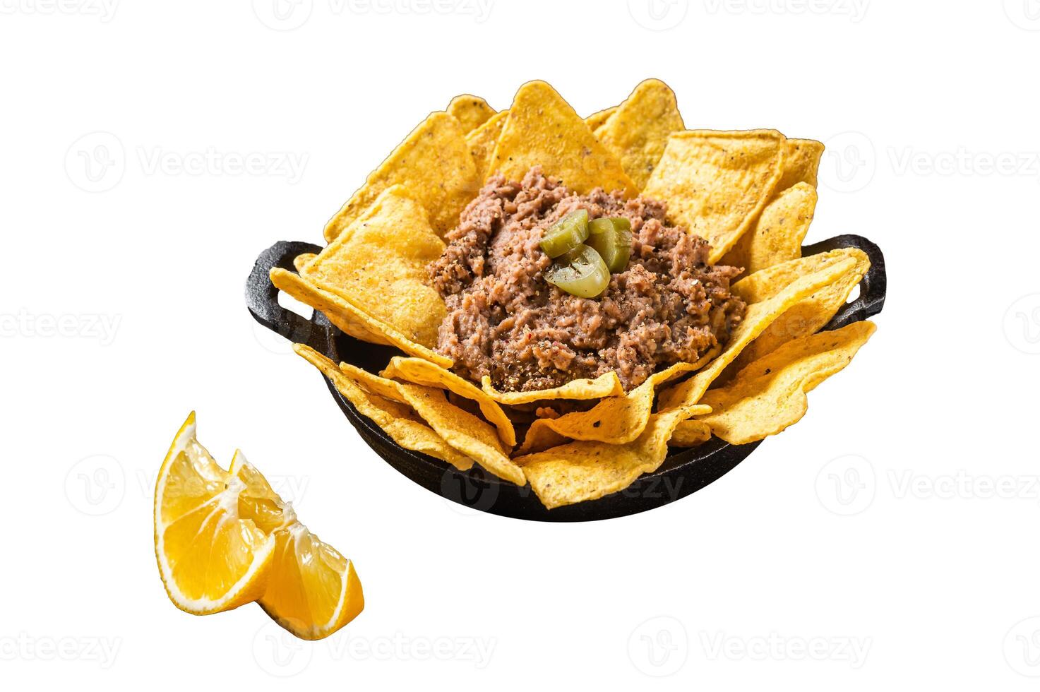 Mexican Baked nachos with chili con carne in a skillet. Isolated on white background. Top view. photo