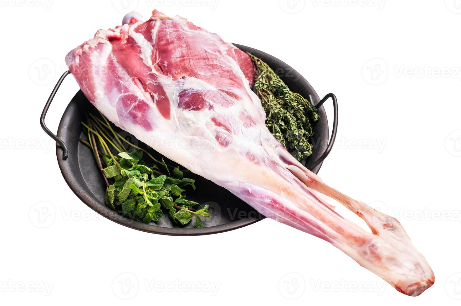 Uncooked whole lamb leg, raw mutton meat with herbs for cooking isolated on white background. top view photo