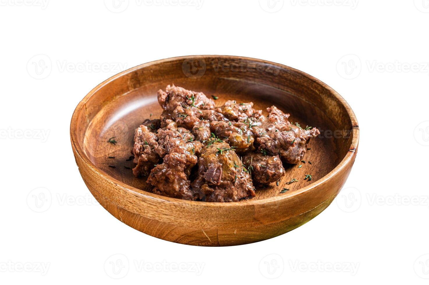 Stewed beef meat in a wooden plate. Isolated on white background, top view. photo