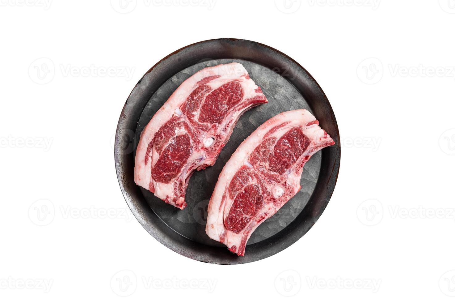 Raw fresh lamb loin chops with herbs and spices in steel tray. Isolated on white background. photo