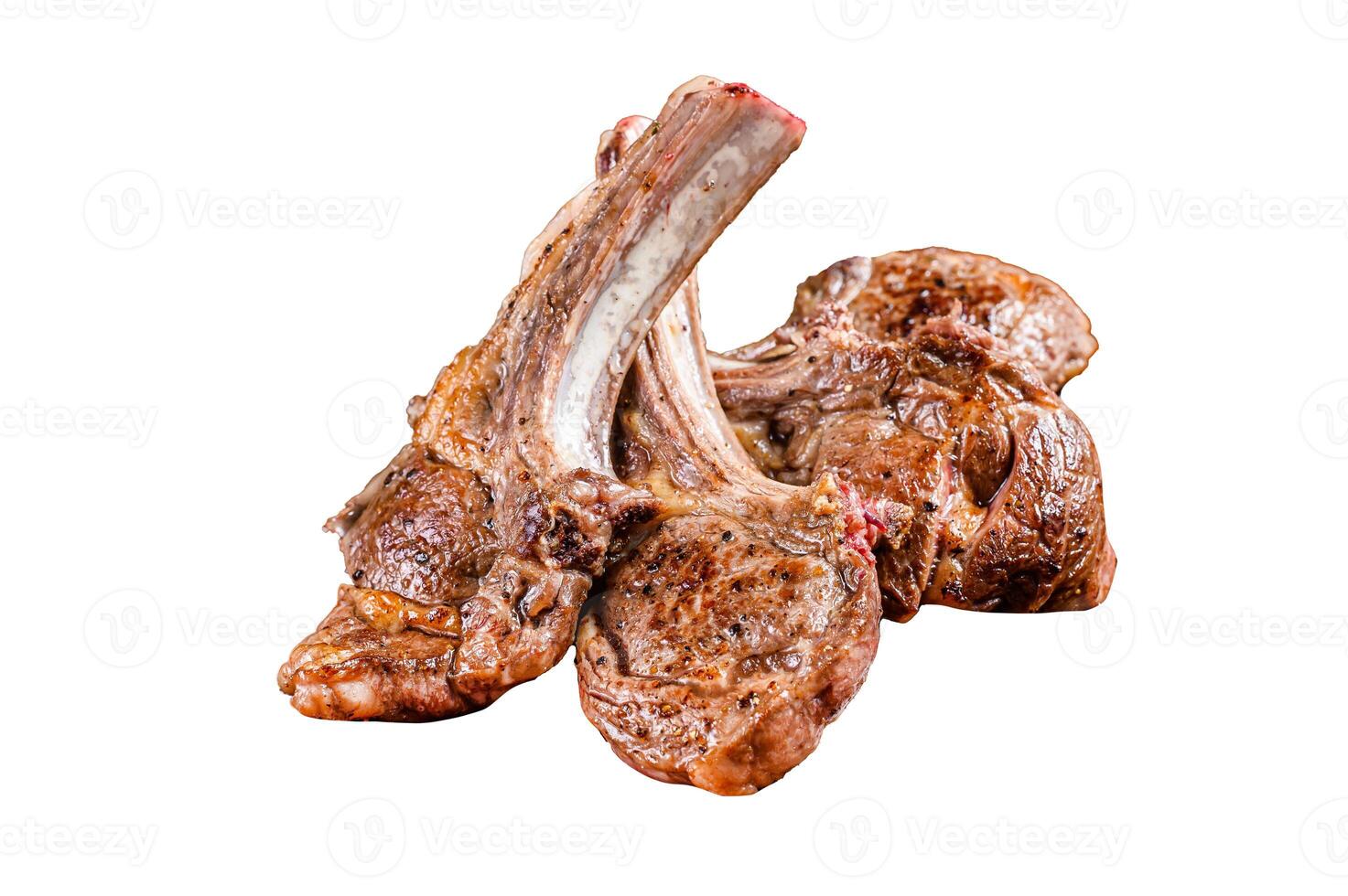 BBQ grilled lamb mutton meat chops steaks on a plate. Isolated on white background, top view. photo
