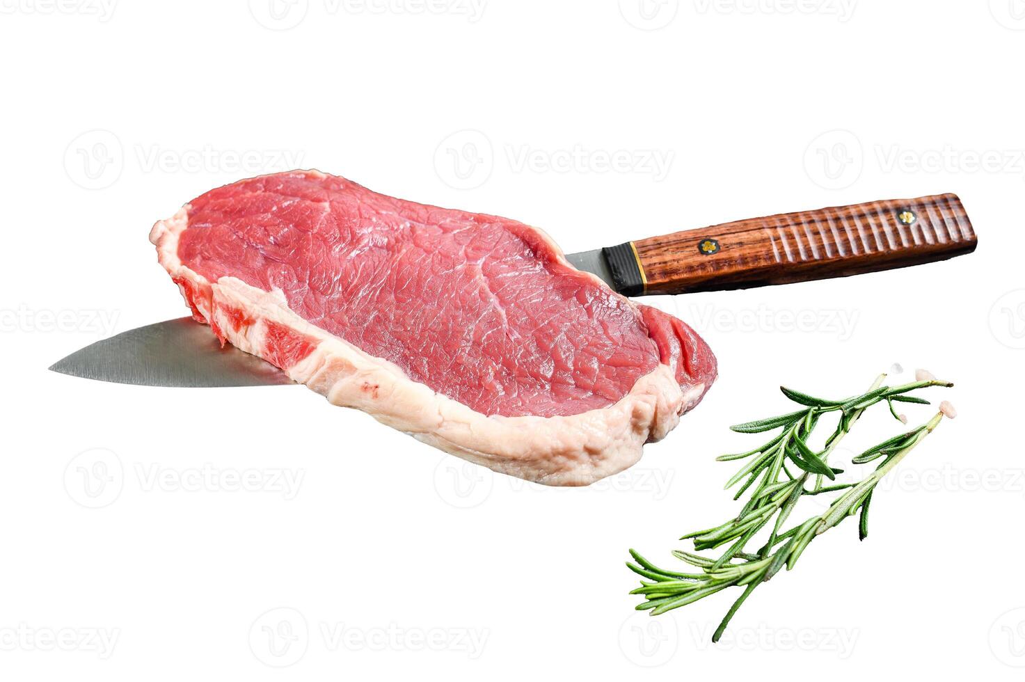 Raw New York steak or striploin with herbs. Isolated on white background. Top view. photo