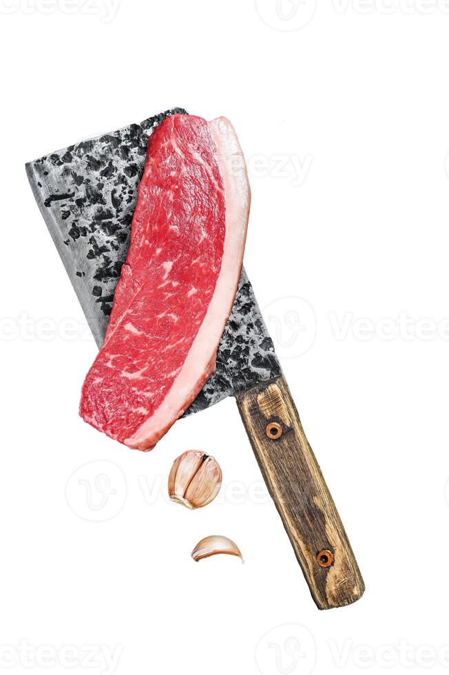 Fresh Raw top sirloin beef meat steak on a butcher cleaver. Isolated on white background, top view. photo
