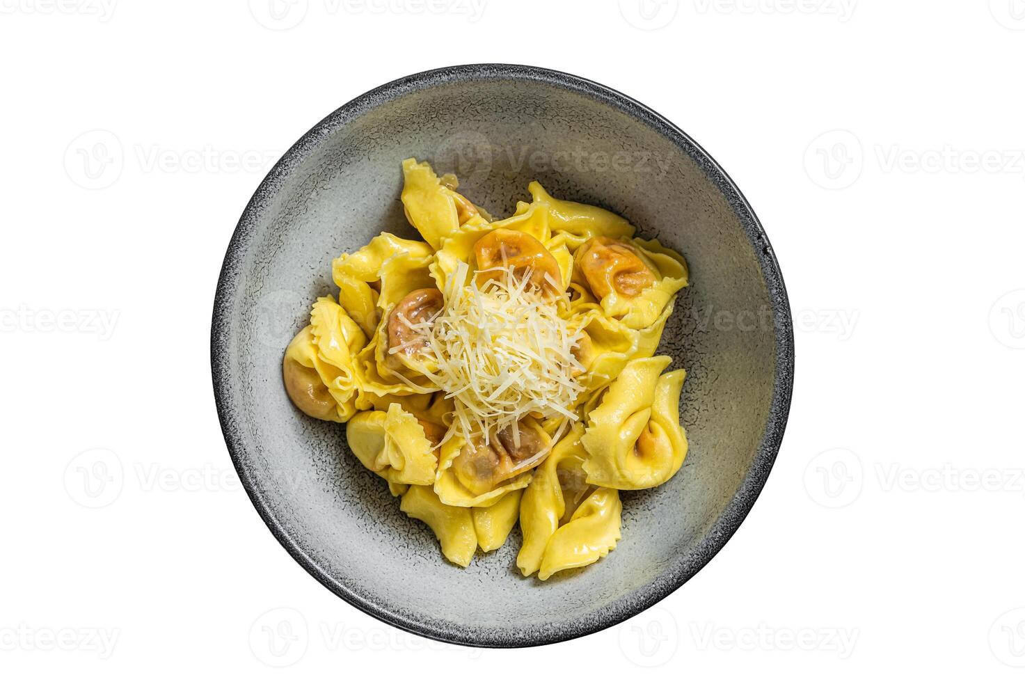 Pasta Italiana ravioli with Mozzarella cheese and Tomato in plate. Isolated on white background. photo