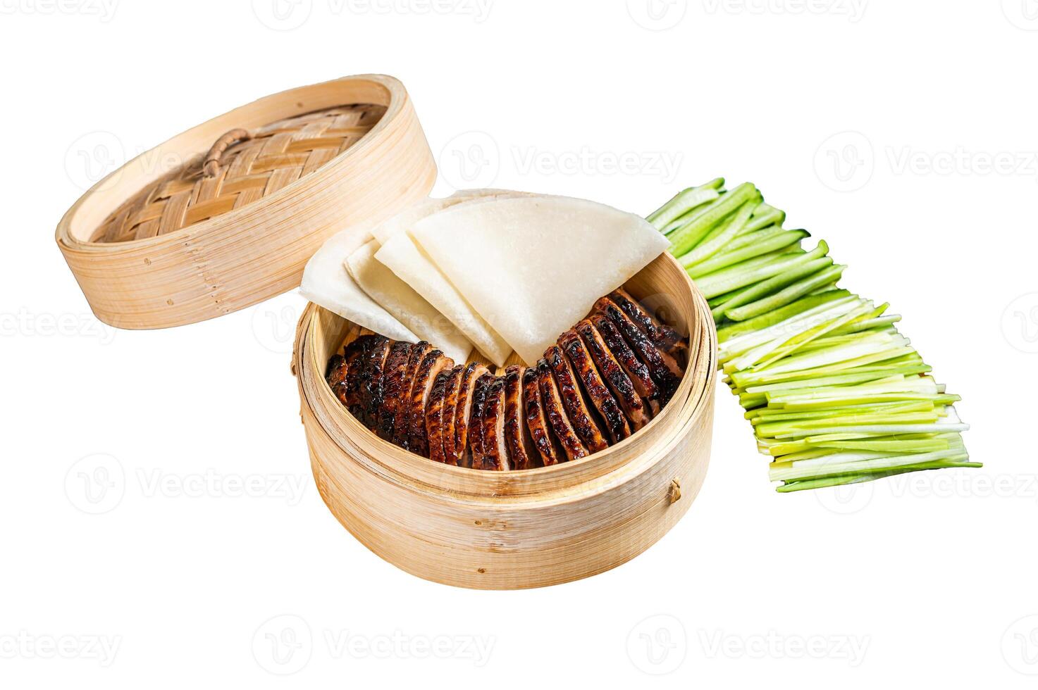 Peking Duck in bamboo steamer served with cucumber, green onion, and wheaten chinese pancakes and sauce Hoysin. Isolated, white background. photo