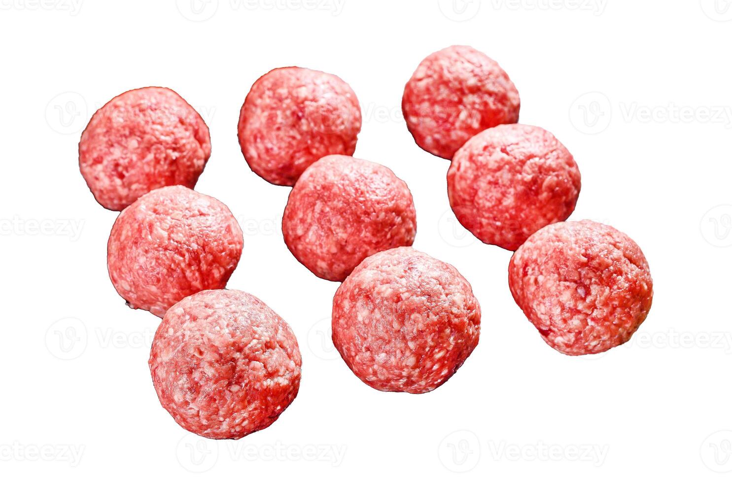 Raw meatballs made from ground beef. Isolated on white background. Top view. photo