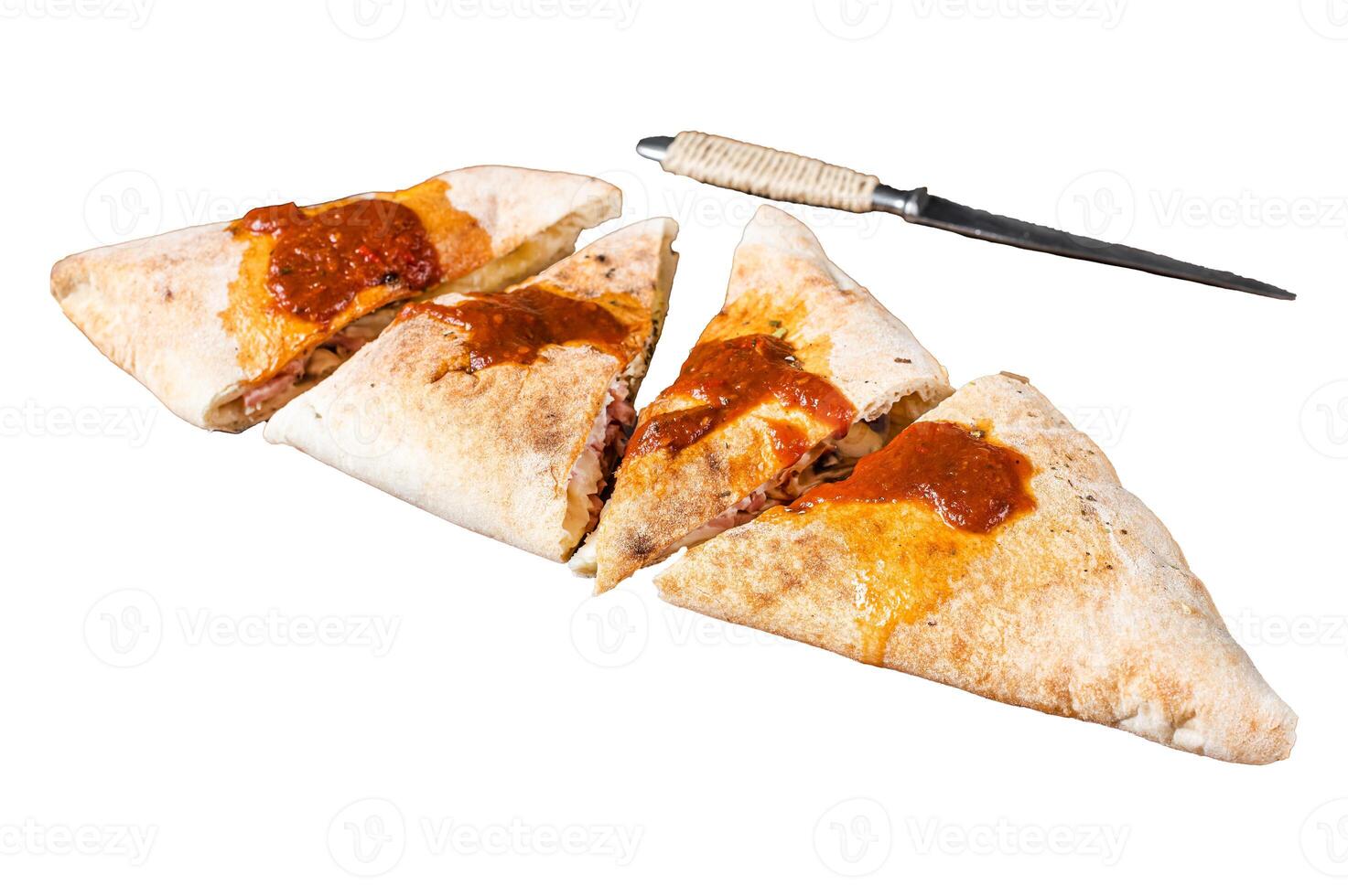 Cut and sliced Calzone closed pizza with ham and cheese Isolated on white background, top view. photo