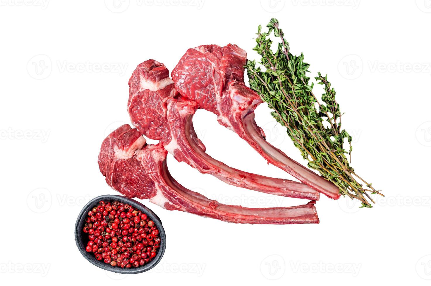 Uncooked Raw Lamb chop steak, mutton cutlet on marble board. Isolated, white background. photo