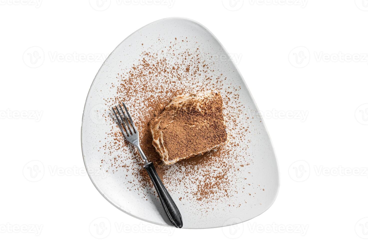 Tiramisu Italian cake with cocoa in a plate. Isolated on white background. photo