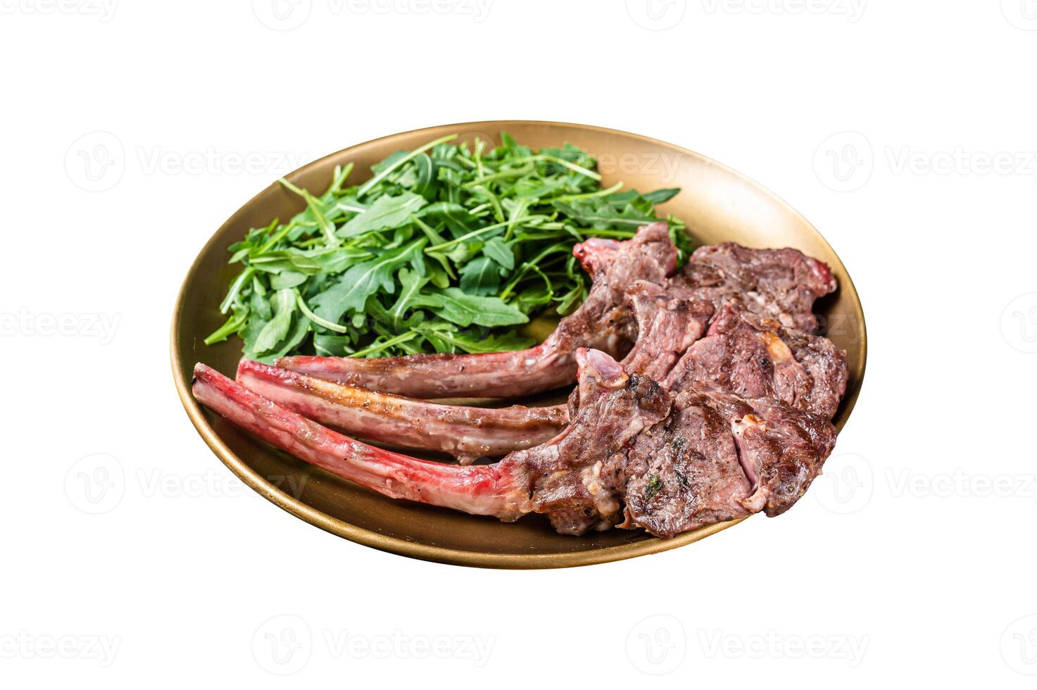 BBQ grilled lamb cutlet or mutton chop steak with arugula salad on a plate. Isolated on white background. Top view. photo