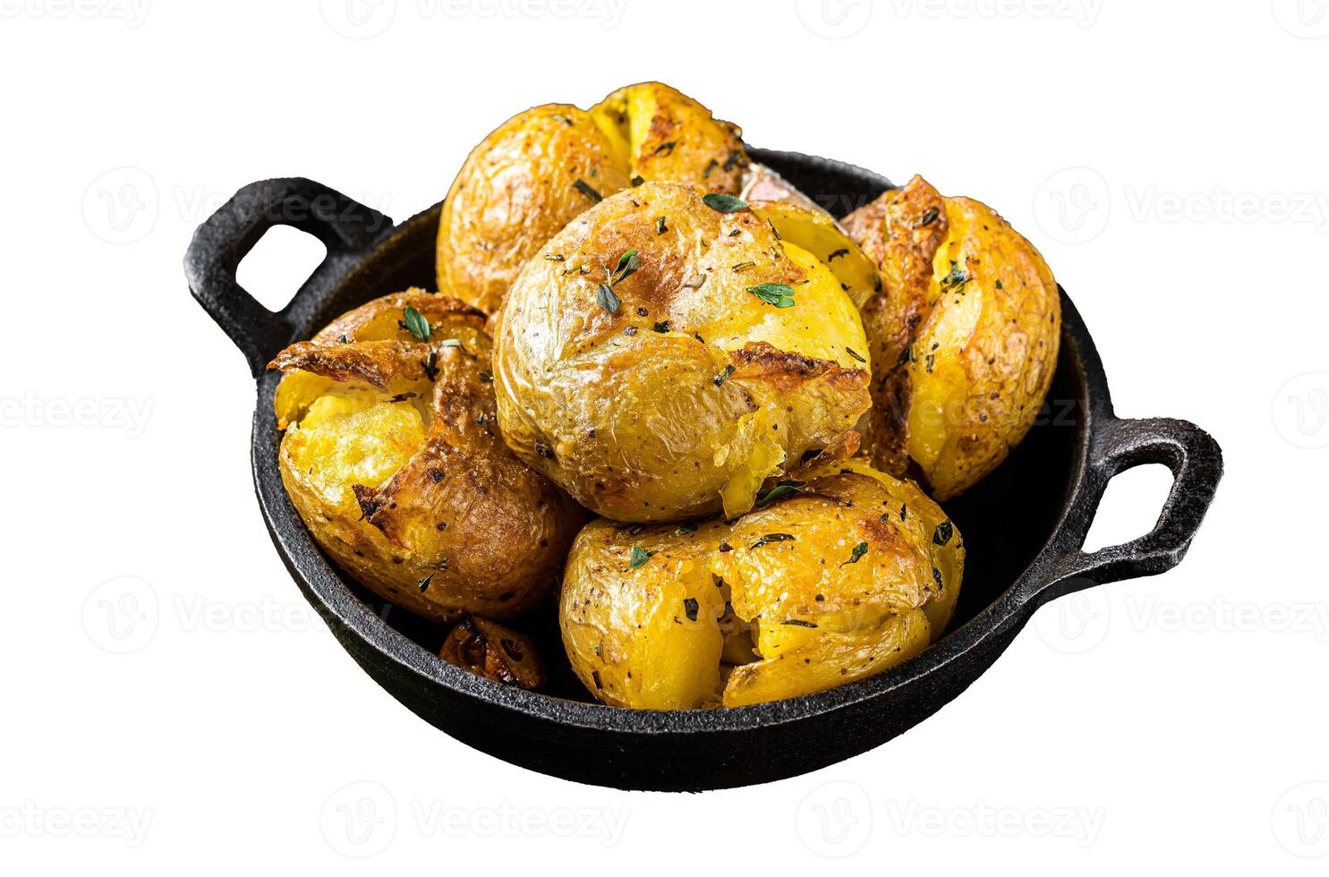 Crushed, Broken potatoes baked in oil with herbs. Isolated, white background. photo