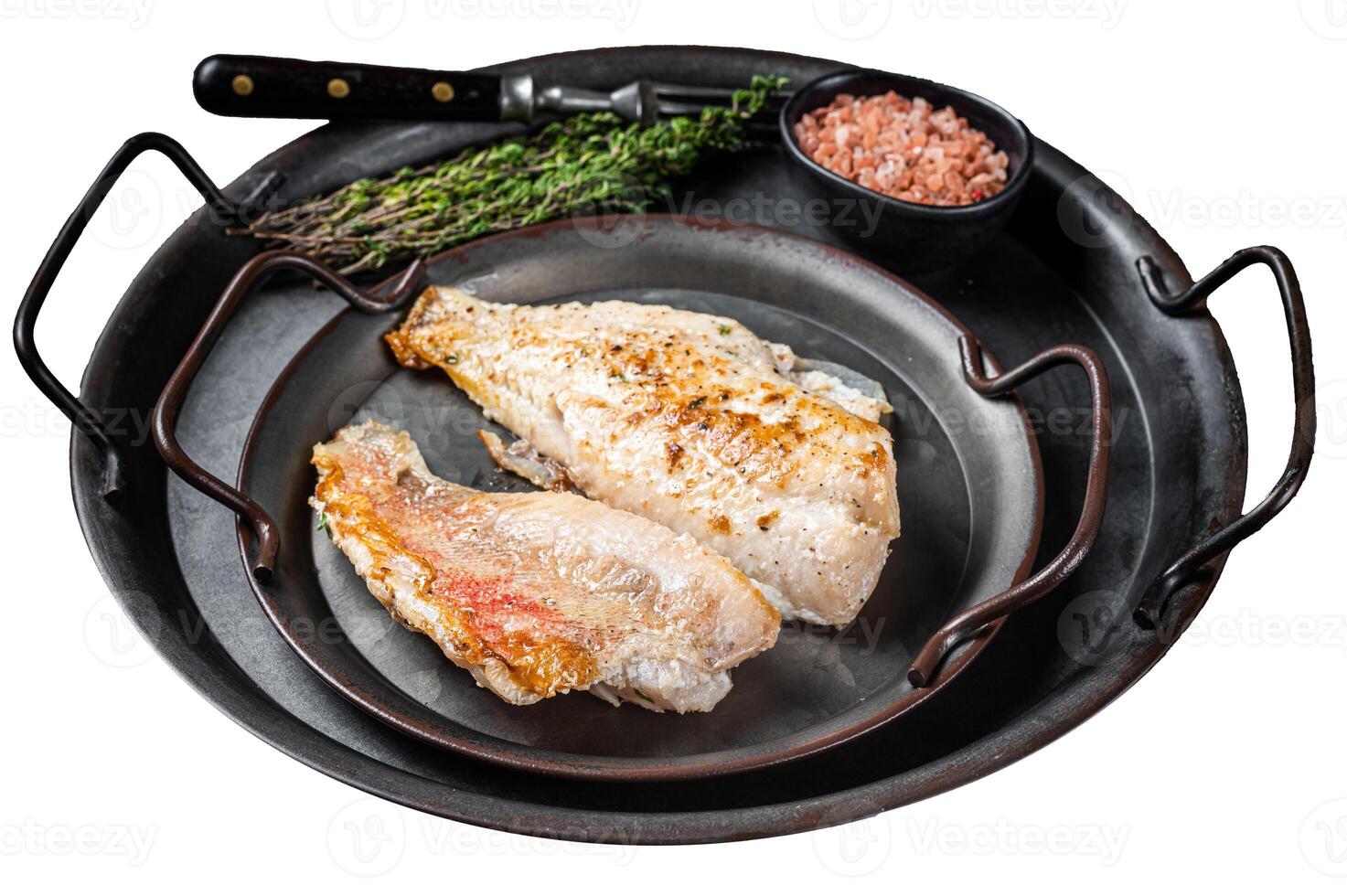 Roasted ocean red perch fillet with olive oil, thyme and spices. Isolated on white background. Top view. photo