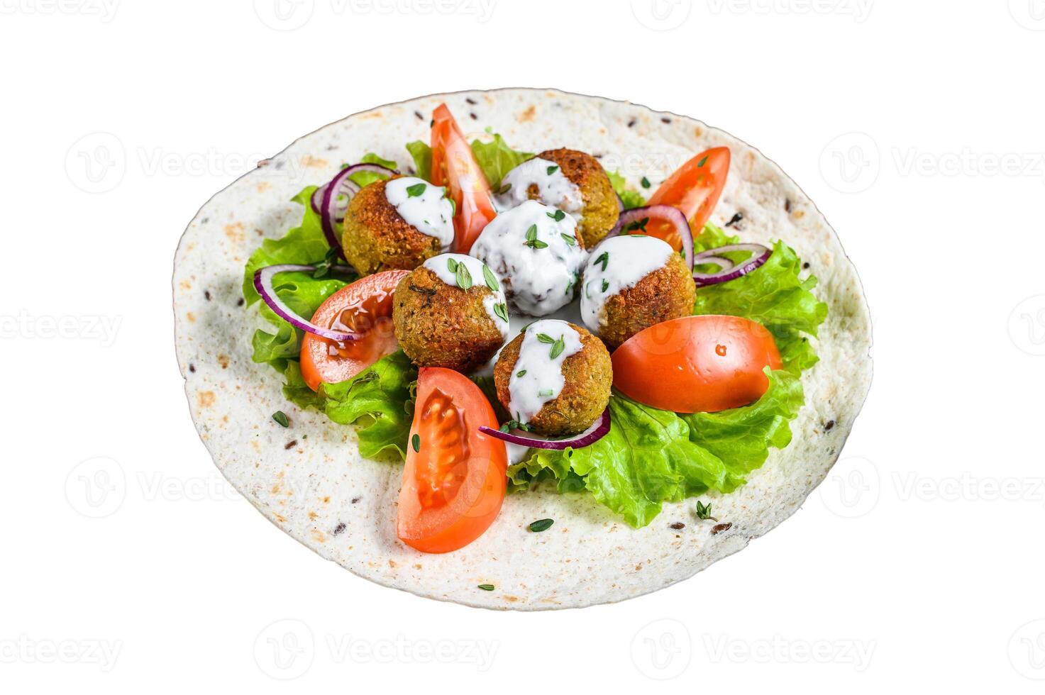 Vegetarian falafel with vegetables and tzatziki sauce on a tortilla bread. Isolated on white background. photo