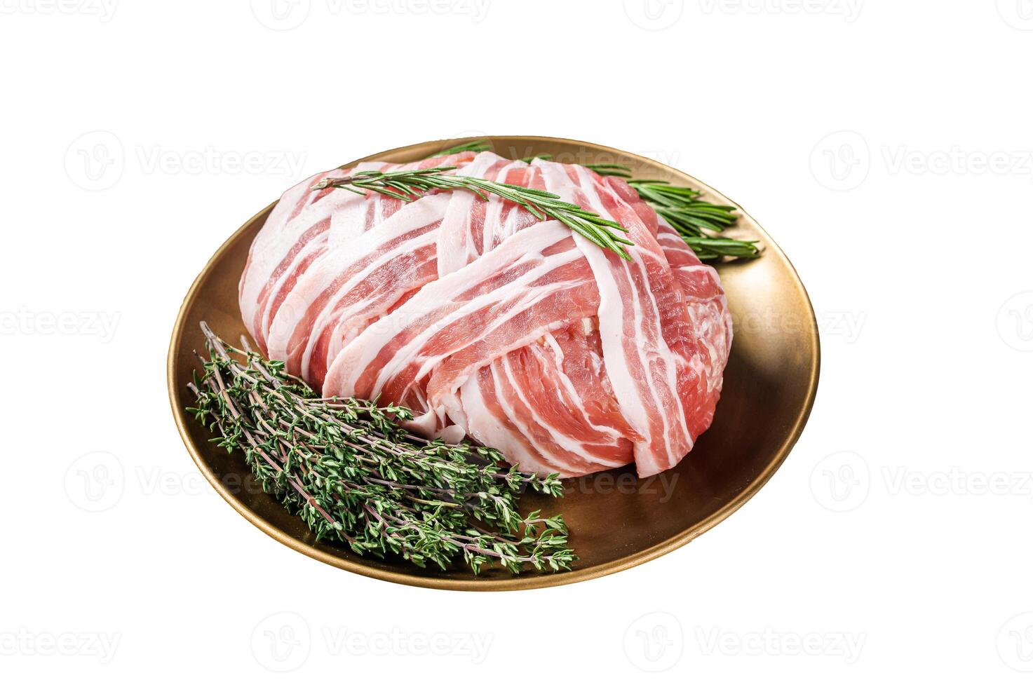 Raw meatloaf with ground beef meat and bacon with herbs and spices, fresh meat loaf. Isolated on white background. photo