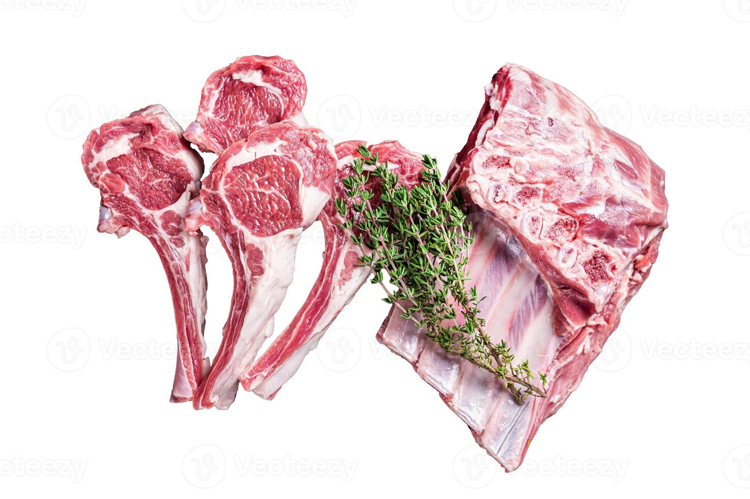 Fresh Raw lamb meat chop steaks on kitchen table with spices and herbs. Isolated, white background. photo
