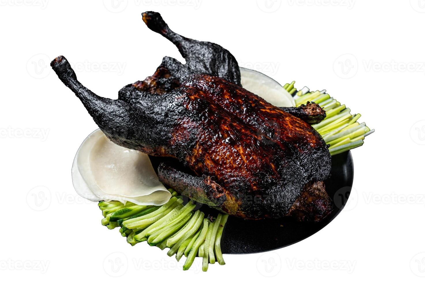 Traditional whole roasted Christmas Peking duck with herbs and sauce. Isolated on white background. Top view. photo
