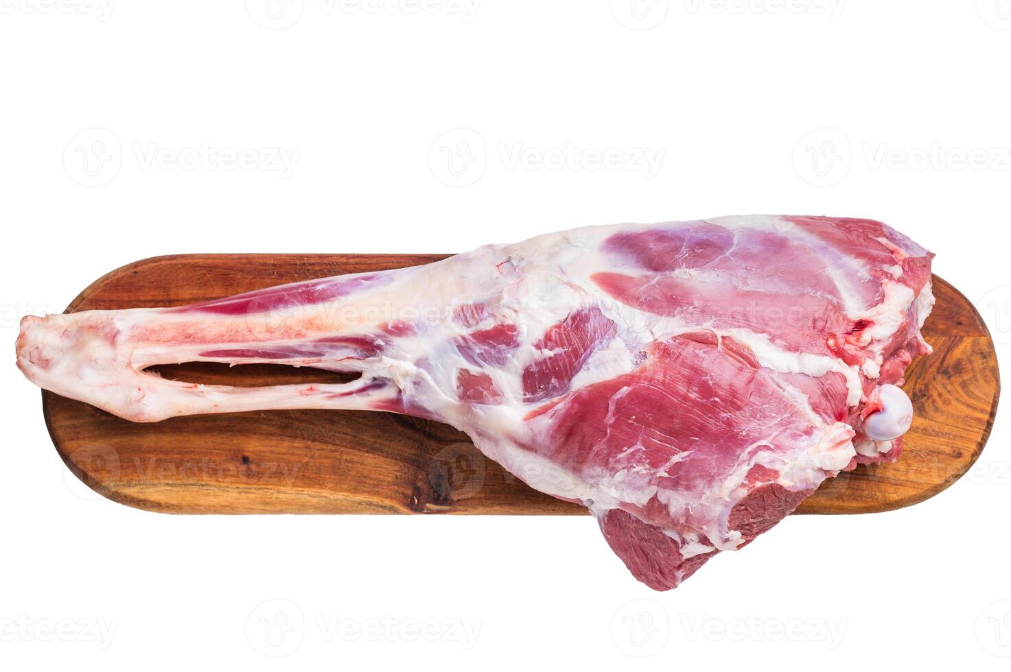 Whole raw lamb leg, uncooked mutton meat on butcher board isolated on white background. top view photo