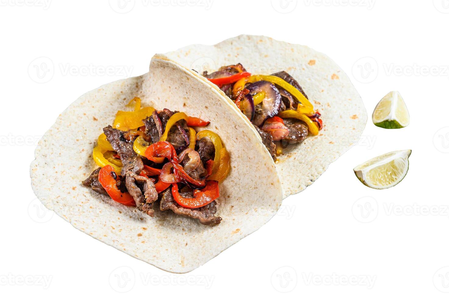 Fajitas with beef meat stripes, colored bell pepper and onions, served with tortillas and salsa. Isolated on white background. photo