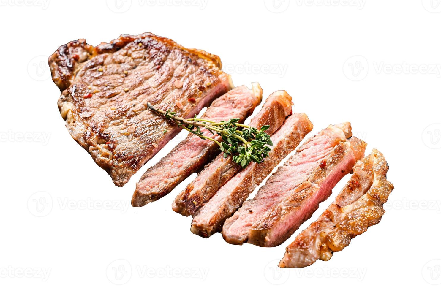 BBQ Striploin steak or strip new York on a stone plate. Isolated on white background. Top view. photo