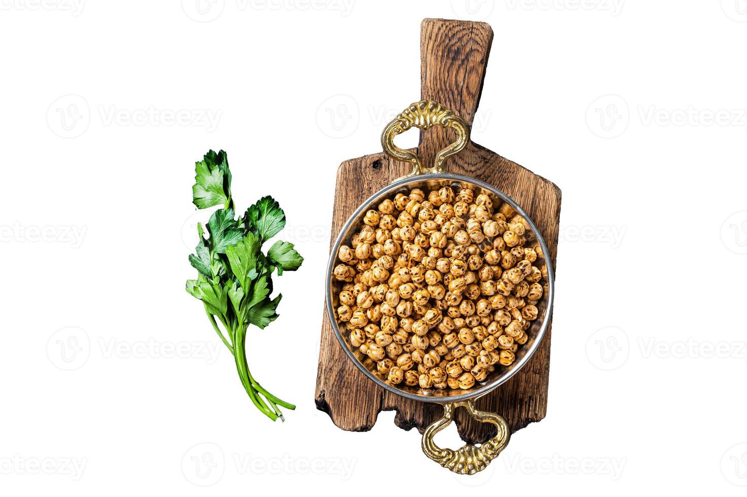 Fried chickpeas with turmeric, roasted spicy chickpeas or Indian chana or chole in a skillet. Isolated on white background, top view. photo