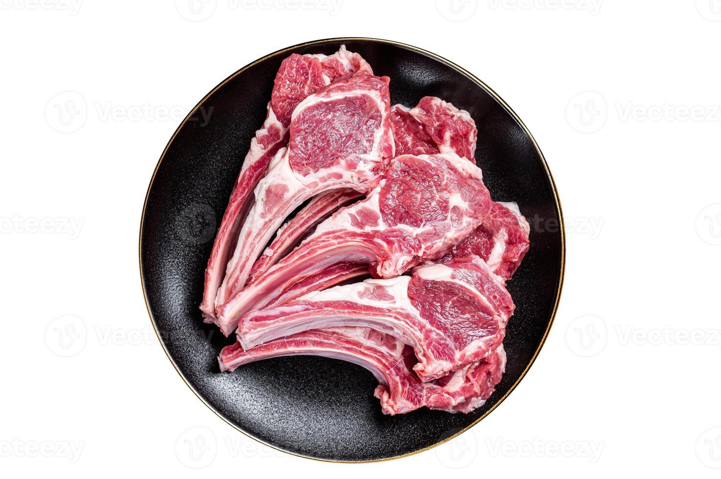 Raw lamb chops, fresh mutton meat cutlets on a ribs. Isolated on white background. photo