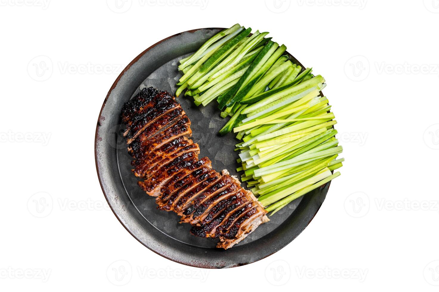 Peking Duck served with cucumber, green onions, and roasted wheaten chinese pancakes with sauce Hoysin. Isolated on white background. photo