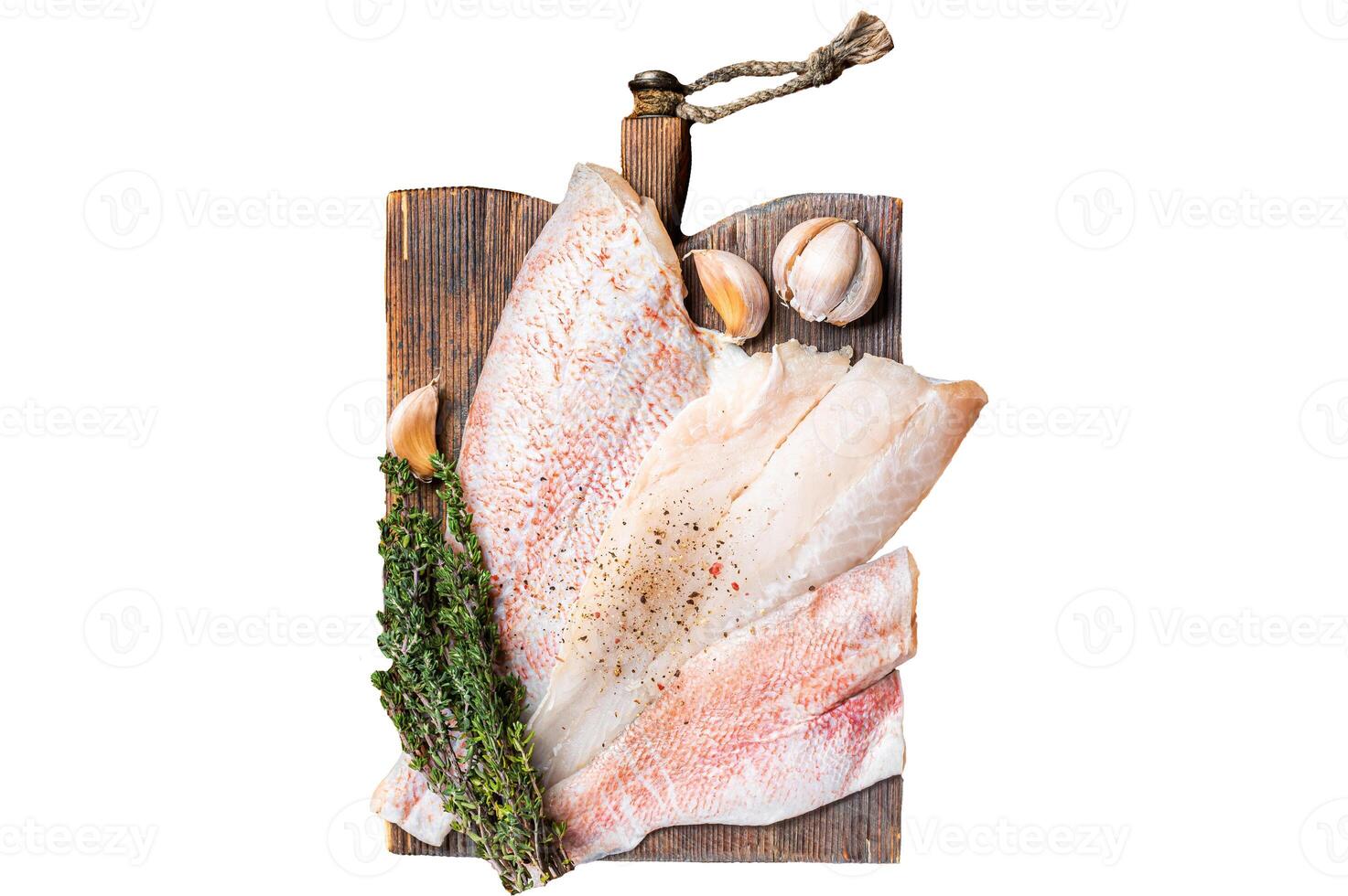Uncooked ocean red perch fillet, redfish with herbs and spices. Isolated, white background. photo
