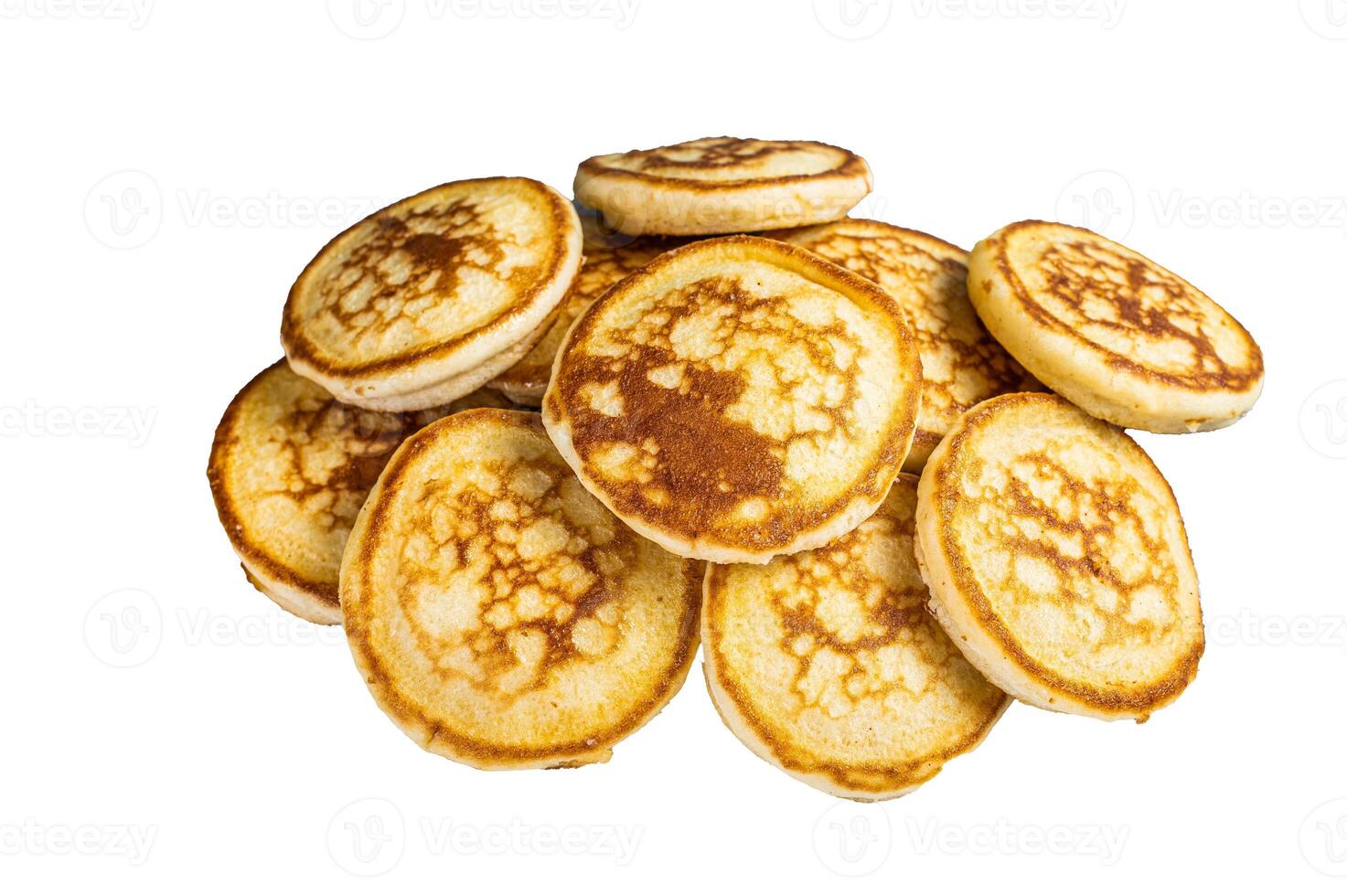 Stack of buttered pancakes on a kitchen table. Isolated on white background photo