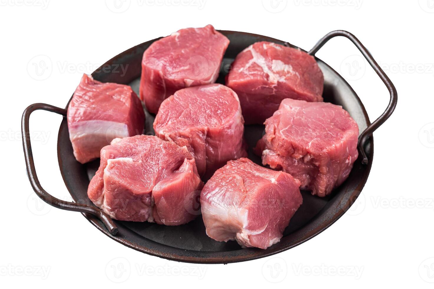 Raw pork tenderloin medallions steaks. Isolated on white background. photo