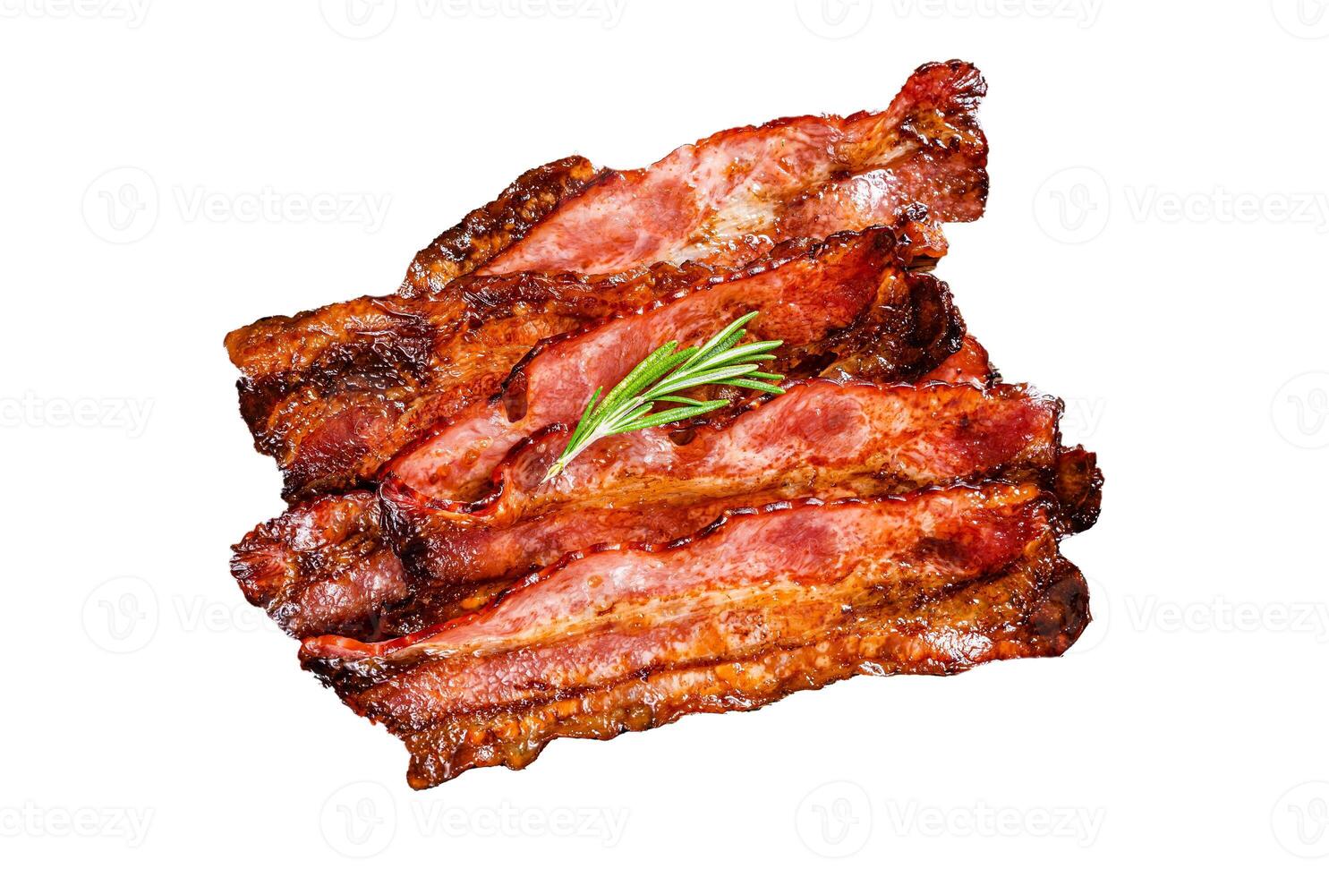 Roasted pork Bacon sizzling slices Isolated on white background, top view. photo