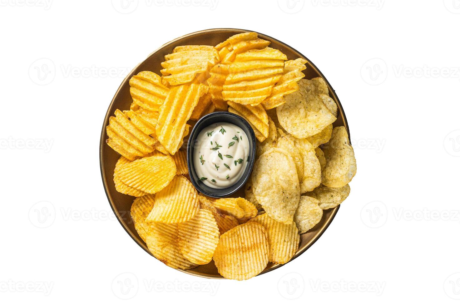 Variety of Potato chips in a plate served with dip sauce. Isolated on white background photo