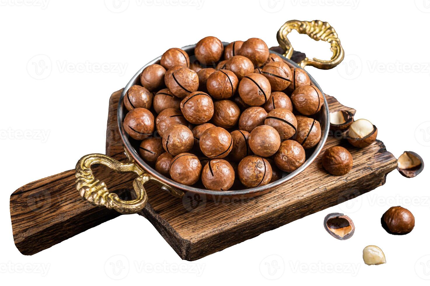 Macadamia nuts in a shell ready to eat. Isolated, white background. photo