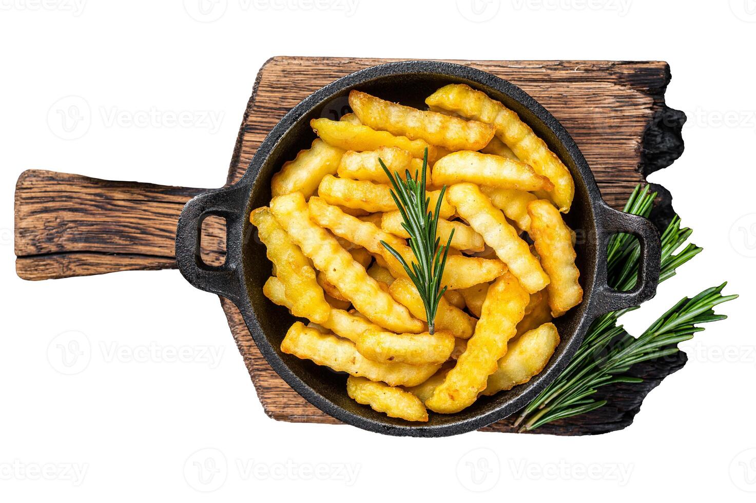 Fried Crinkle French fries potatoes in a pan. Isolated on white background, top view. photo