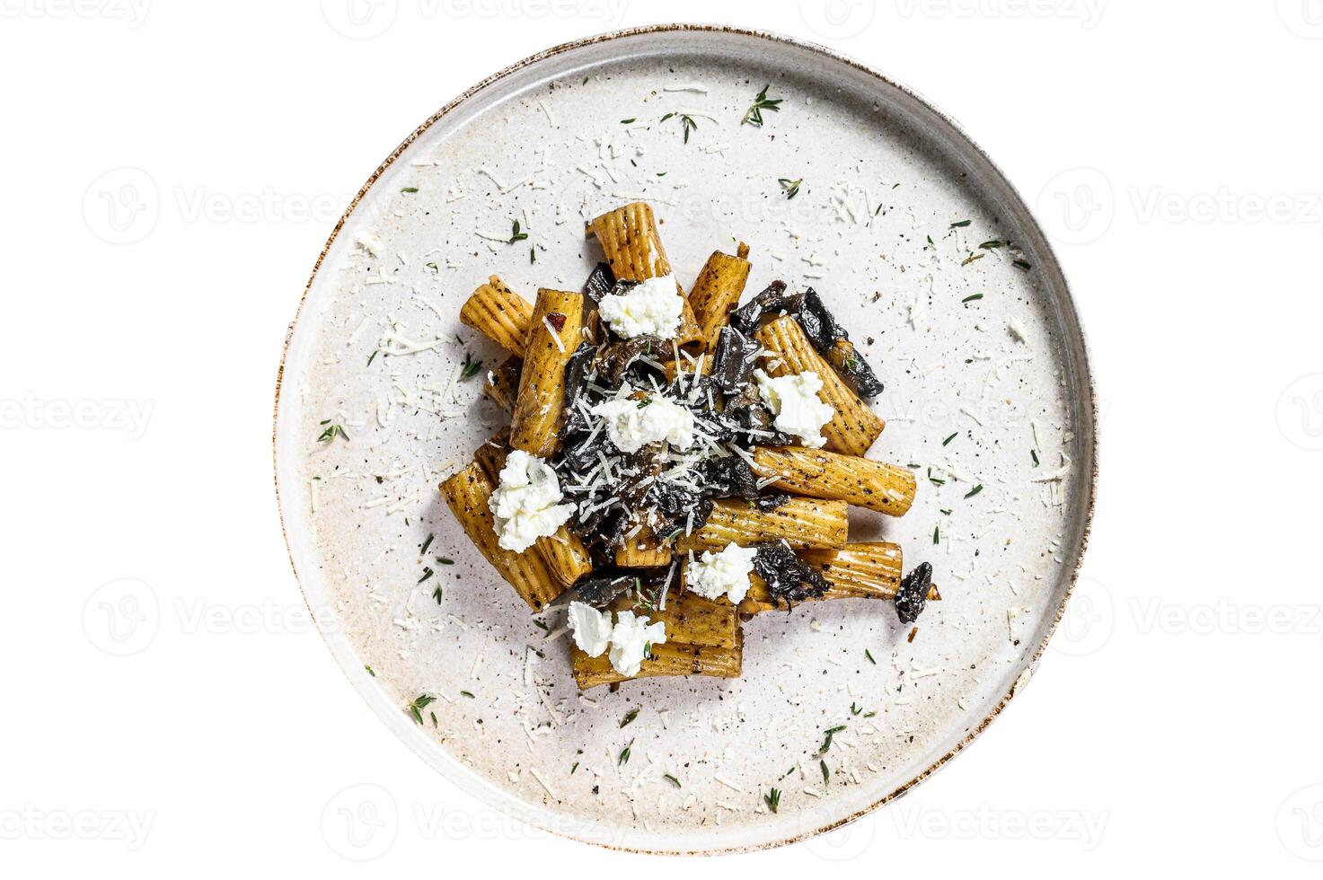Pasta tortiglioni with black truffle and Boletus edulis, white mushroom. Isolated on white background. photo