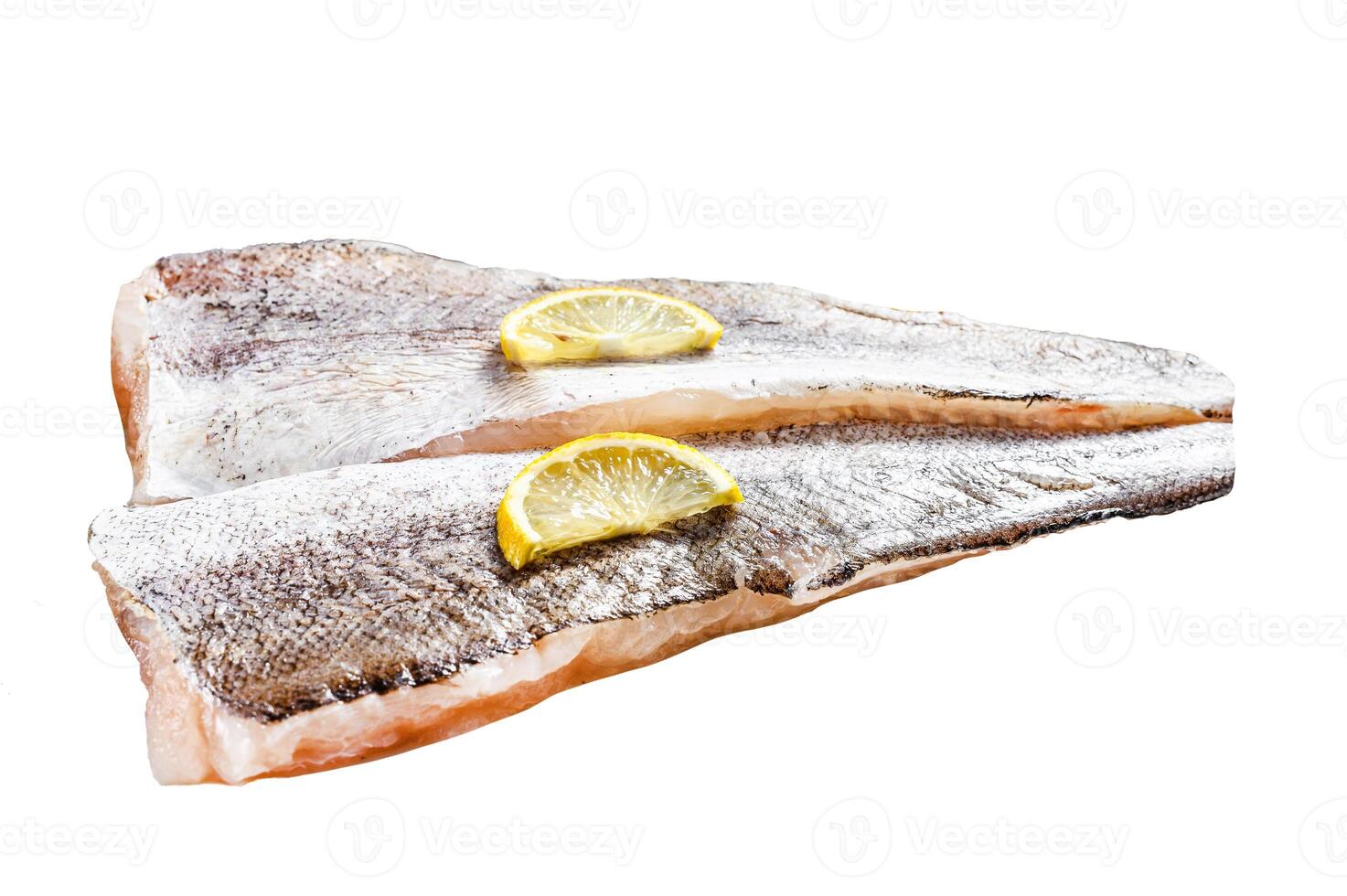 Fresh raw hake fish fillet with pepper and lemon. Isolated on white background. Top view. photo