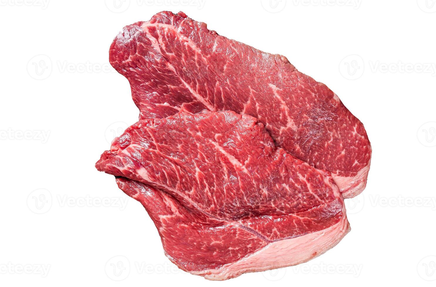 Prime beef veal steaks, raw meat with spices on butcher cutting board. Isolated on white background. photo