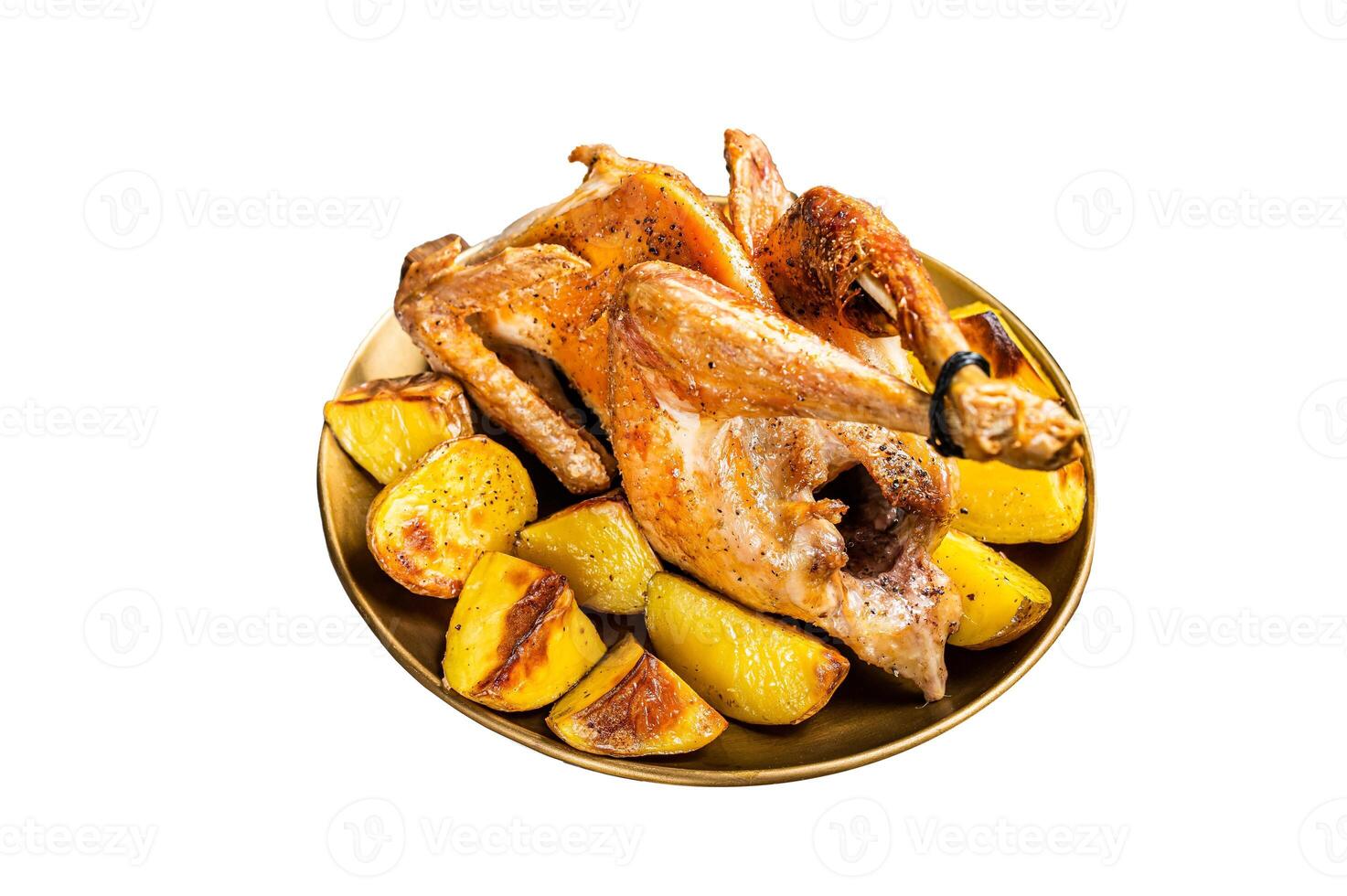 Roasted guinea fowl with herbs and potato, cooked farm eco bird. Isolated on white background. photo