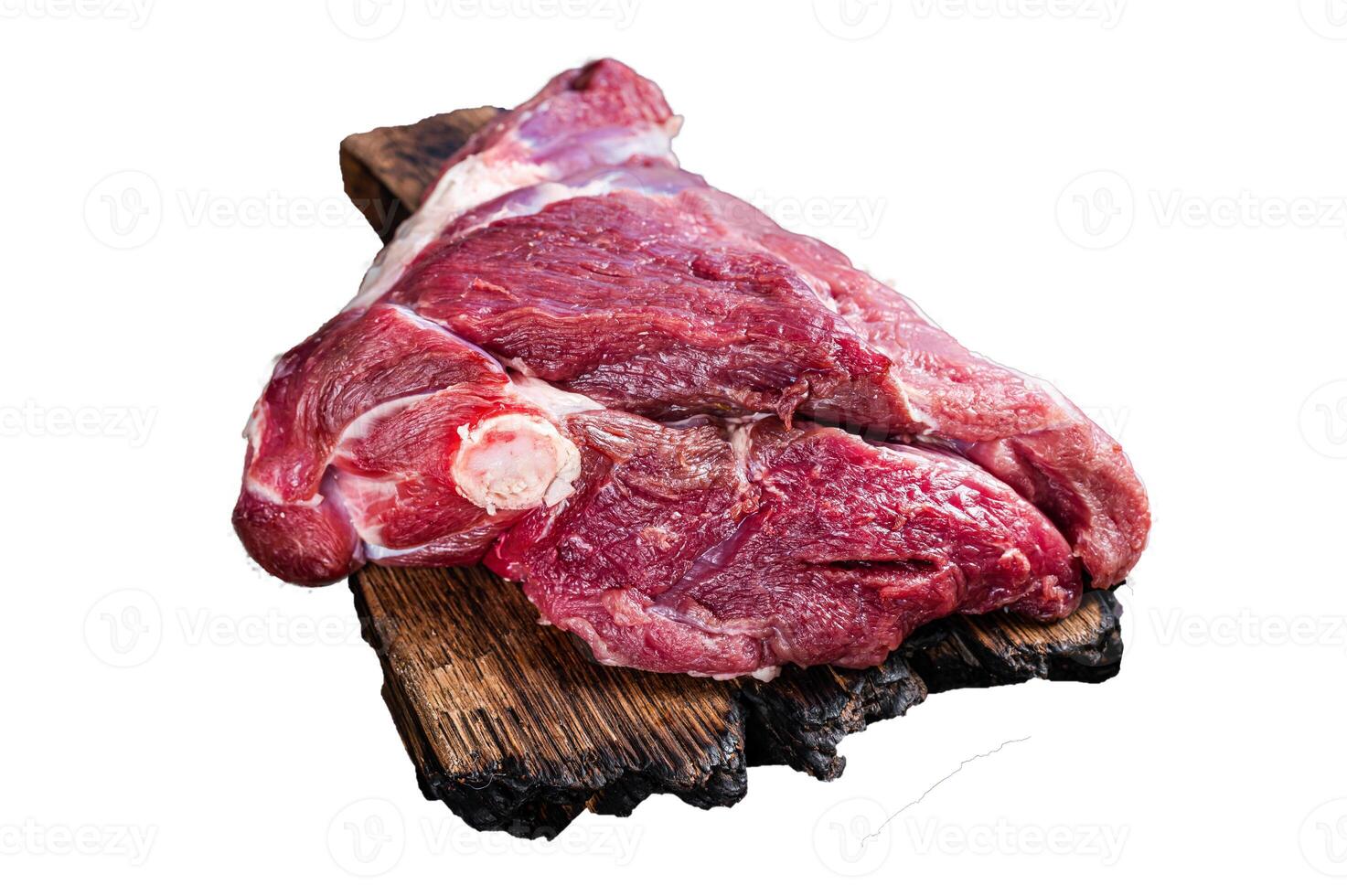 Raw lamb mutton thigh on butcher table. Isolated, white background. photo