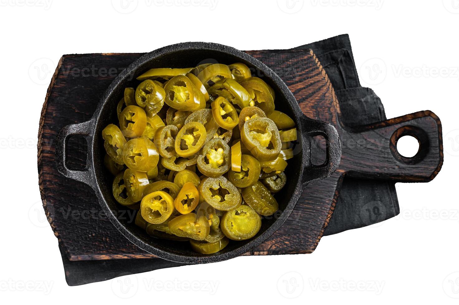 Pickled Green Sliced Jalapenos in a pan. Isolated on white background, top view. photo