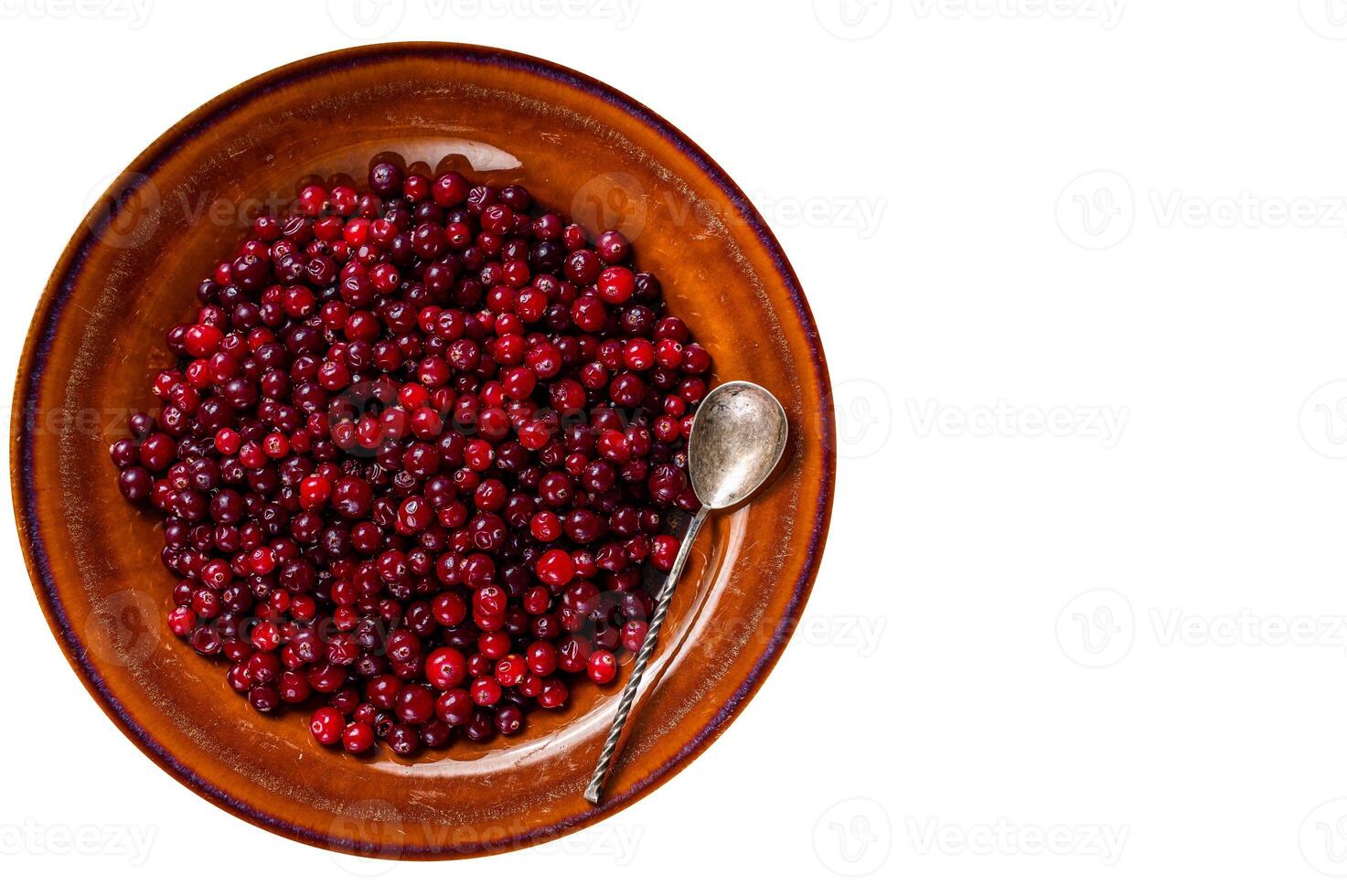 Ripe Red Cranberry berry in a rustic plate. High quality Isolate, white background. photo